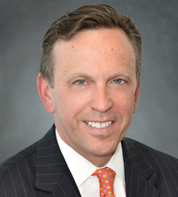 Justin E. Driscoll, Interim President and Chief Executive Officer